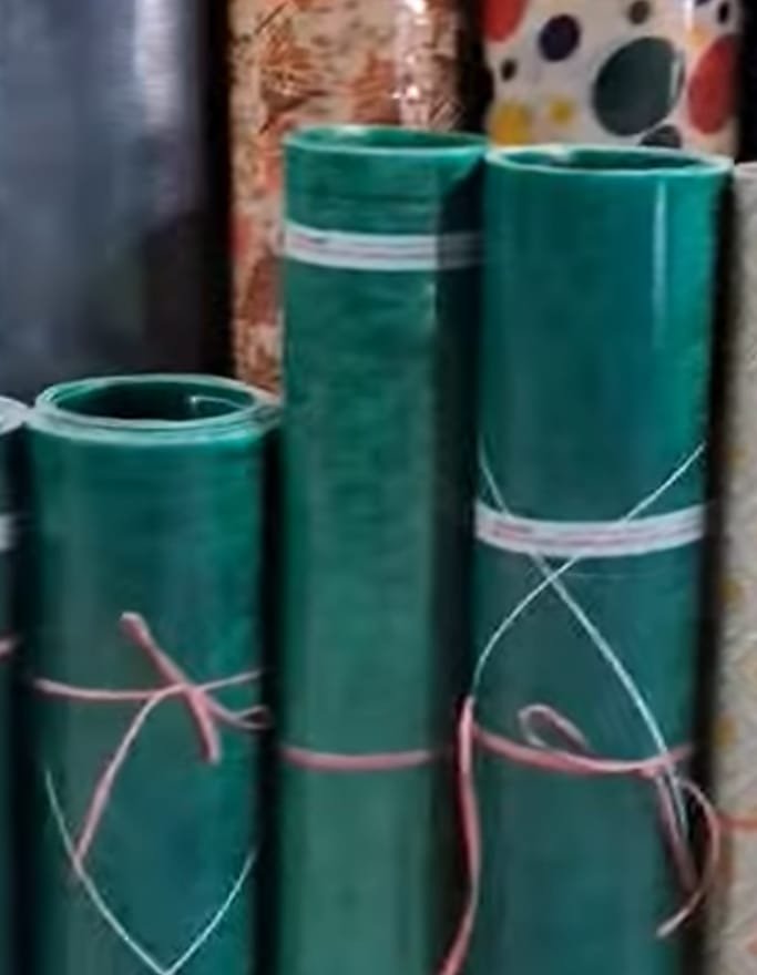 Green bird netting material rolls ready for installation