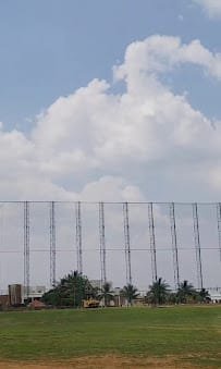 Protective net fitted around a building perimeter
